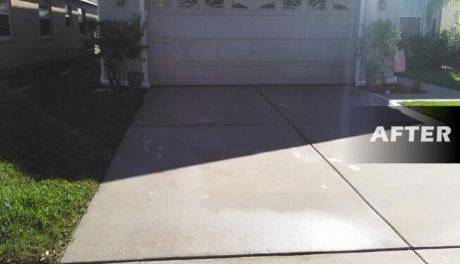 our work pressure washed driveway after